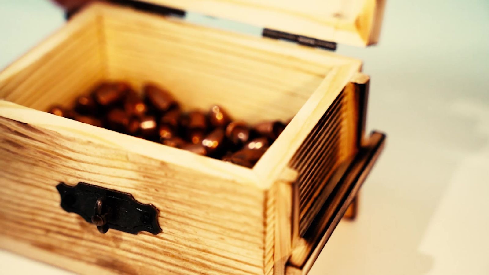 Copper-plated projectiles in a wooden presentation box