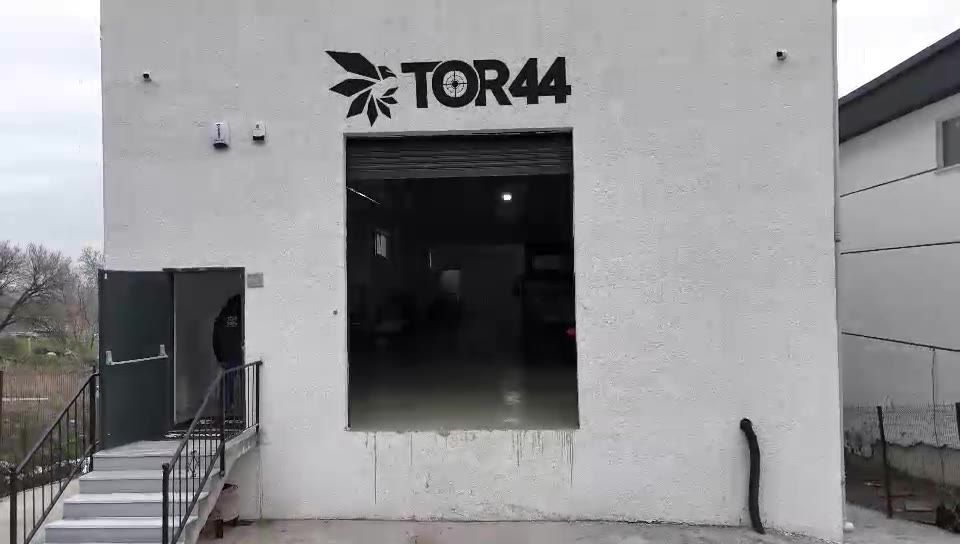 Tor44 building entrance with the company logo
