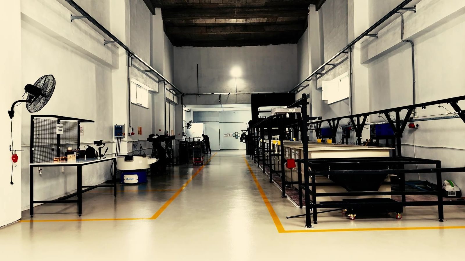 Production hall with marked walkways and machine lines