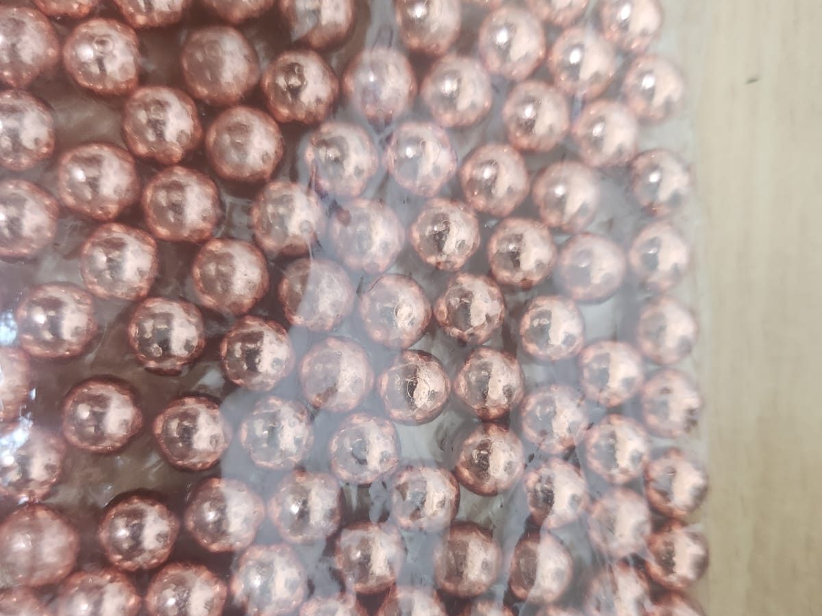 Bag of TOR44 copper-plated lead pellets