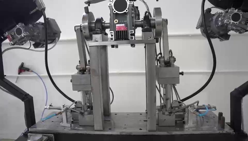 Twin-station precision restrike press with its feeder bowls